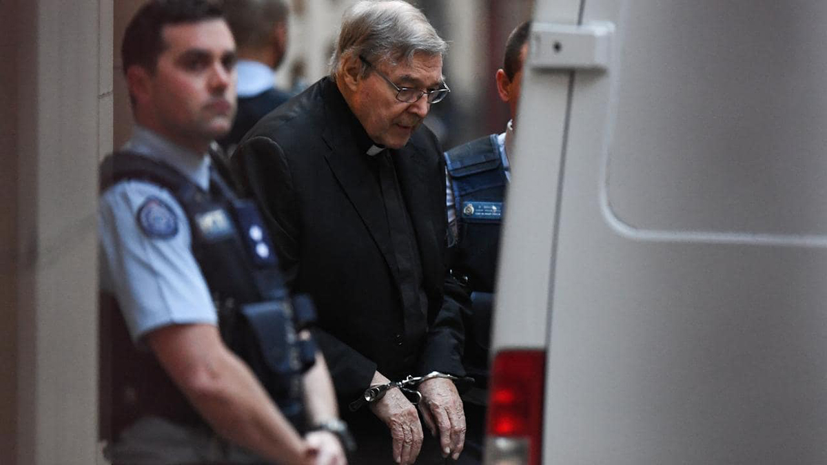 Appeal George Pell is escorted from the Victorian Supreme Court. Picture: AAP