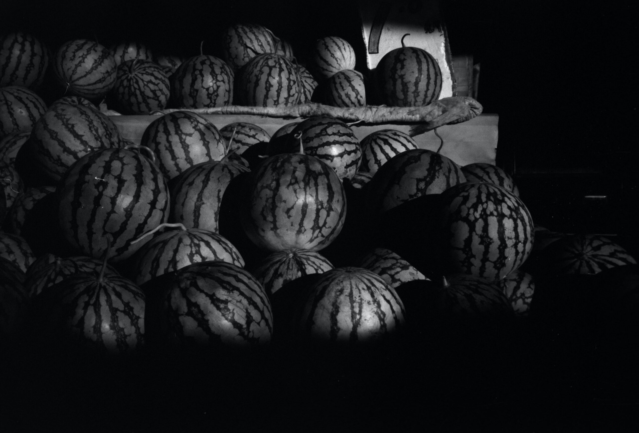 grayscale photo of watermelons