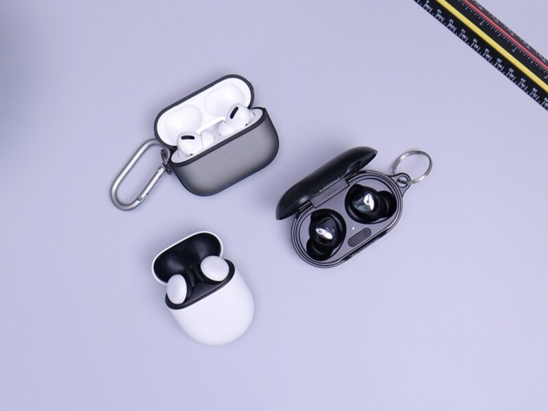 black and white headphones on white table
