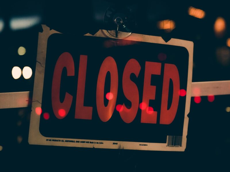 red and black closed sign