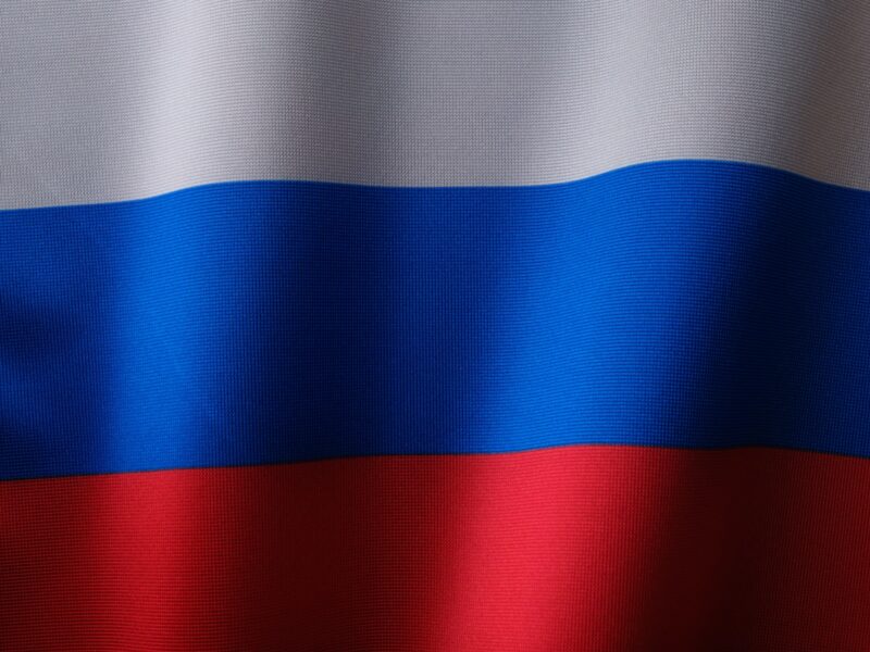 a close up of a red, white and blue flag